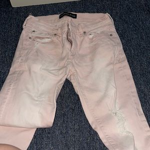 Express jeans mid rise size 6R light pink ripped!!